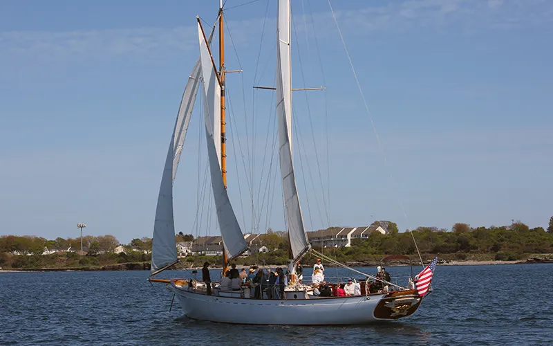 Madeleine5 Schooner Madeleine sailing in Narragansett Bay with the Newport Bridge in the background at sunset